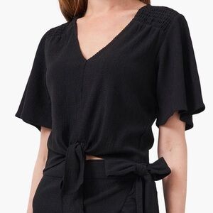 1. State smocked shoulder tie front top